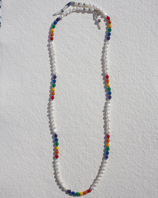Colorful beaded freshwater necklace on a white background