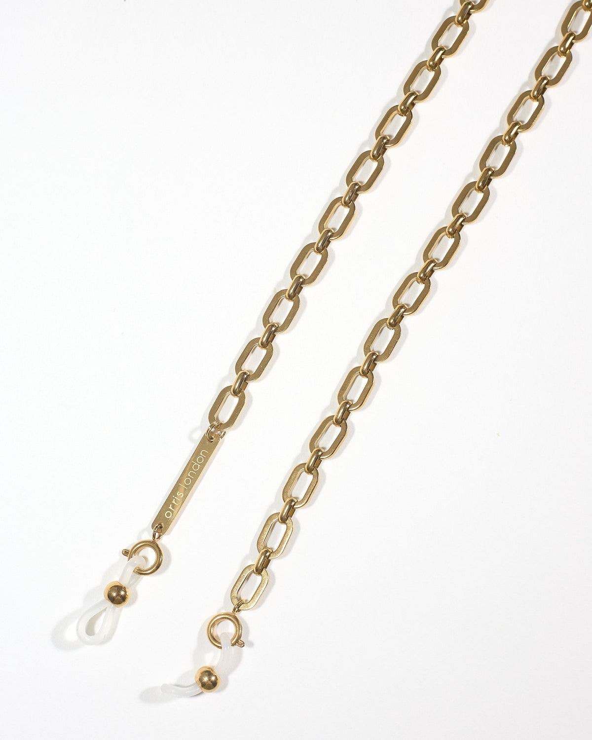 A gold-toned metal chain extender with elongated oval links, shown on a clean white background. One end has a lobster clasp with a clear protective cover, and the other end features a small ball with a clear loop. use as glasses chain